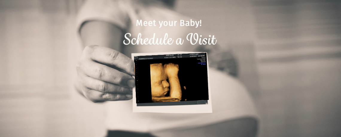 Mom holding 3D 4D Ultrasound image of baby Fort Walton Beach Destin Shalimar Florida